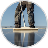 Scrubbing a solar panel with a sponge