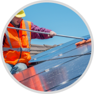 Solar panel cleaners spraying water on a solar panel